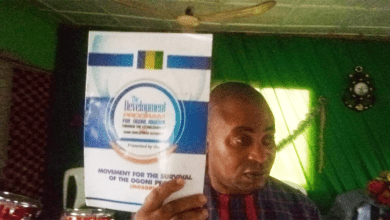Coordinator of MOSOP in Eleme displays copy of the ODA at the MOSOP Cogress. October 29, 2023