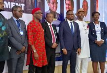 Gov. Otti in a group photograph